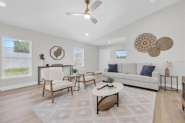 6529 Taylor Ct, New Port Richey, FL 34653 - living room featuring a ceiling fan, light wood finished floors, lofted ceiling, and recessed lighting