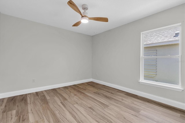 6529 Taylor Ct, New Port Richey, FL 34653 - empty room with light wood finished floors and ceiling fan