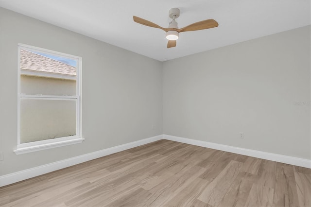 6529 Taylor Ct, New Port Richey, FL 34653 - empty room with light wood-style floors and ceiling fan