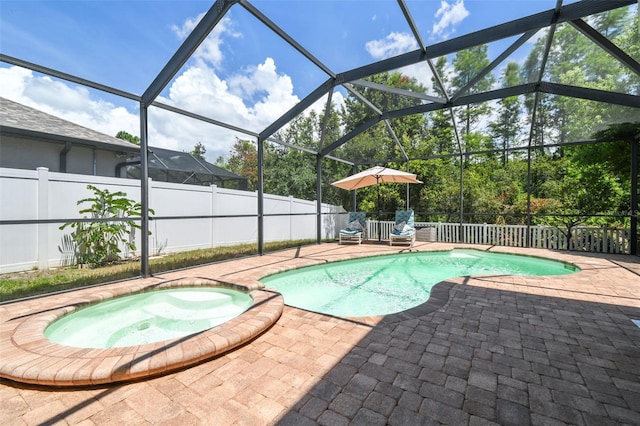11126 Biddeford Pl, New Port Richey, FL 34654 - view of pool with a patio, a lanai, and a pool with connected hot tub