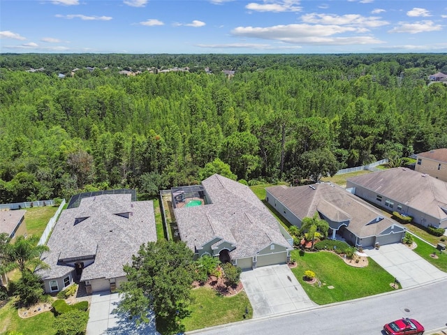 11126 Biddeford Pl, New Port Richey, FL 34654 - aerial perspective of suburban area with a forest