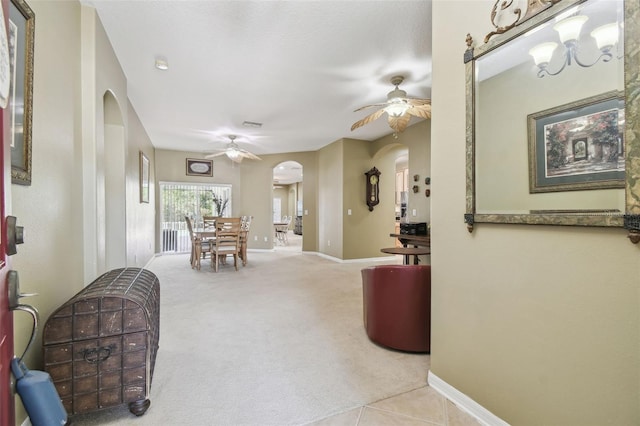 11126 Biddeford Pl, New Port Richey, FL 34654 - corridor with arched walkways and carpet floors