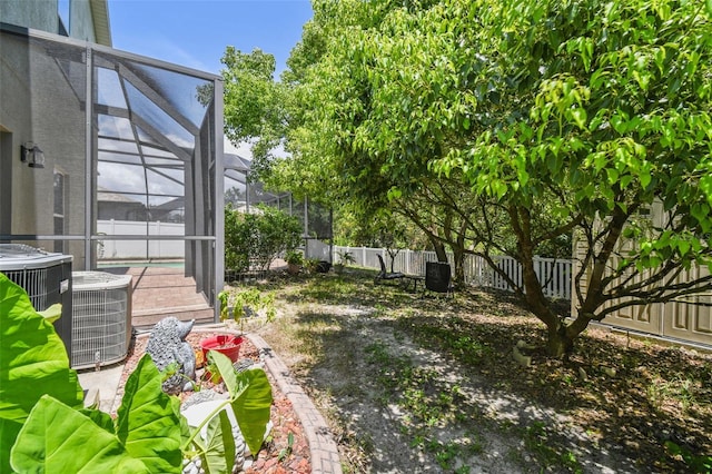 11126 Biddeford Pl, New Port Richey, FL 34654 - fenced backyard featuring a lanai and a swimming pool