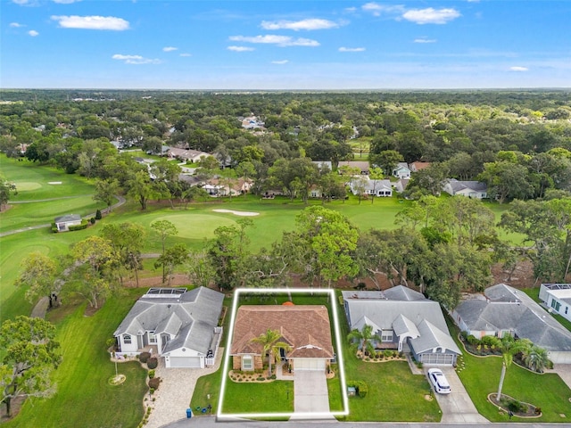 aerial view of residential area with a golf course