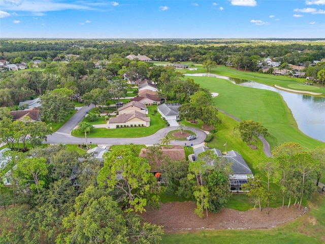 view of property location with nearby suburban area, a large body of water, and a local golf course