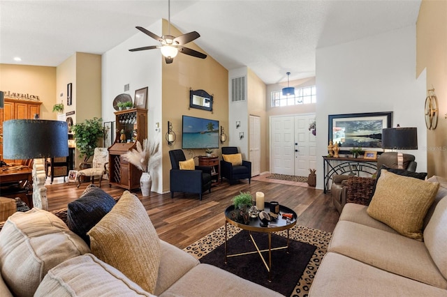 living room with high vaulted ceiling, wood finished floors, and ceiling fan