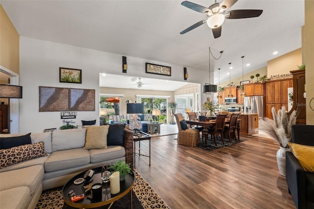 living area featuring ceiling fan, wood finished floors, and recessed lighting