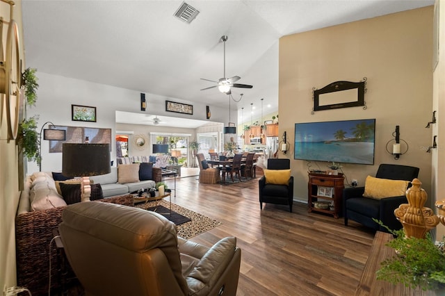 living area featuring ceiling fan and wood finished floors