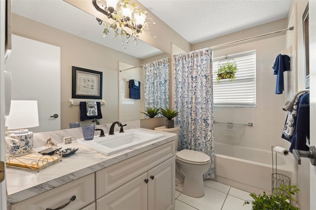 full bath featuring vanity, shower / bath combo, and tile patterned flooring