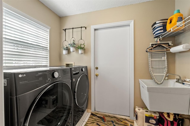 laundry area featuring washer and clothes dryer