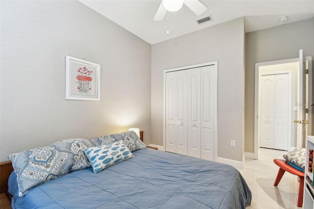 1120 Bluffs Cir, Dunedin, FL 34698 - bedroom featuring a closet, ceiling fan, and light carpet