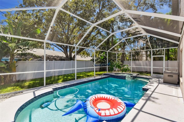 1120 Bluffs Cir, Dunedin, FL 34698 - view of swimming pool with a pool with connected hot tub, a fenced backyard, a patio area, and glass enclosure