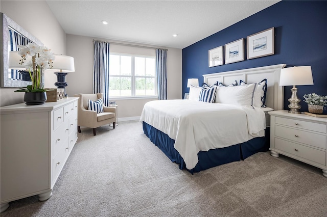 118 Venetian Palms Blvd, New Smyrna Beach, FL 32168 - bedroom with light carpet and recessed lighting