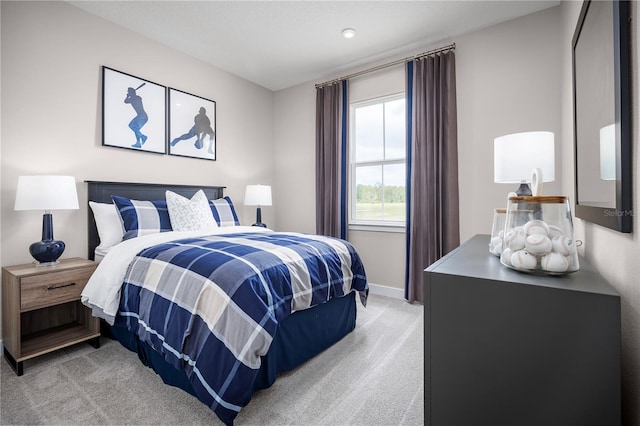 118 Venetian Palms Blvd, New Smyrna Beach, FL 32168 - bedroom featuring light colored carpet and baseboards