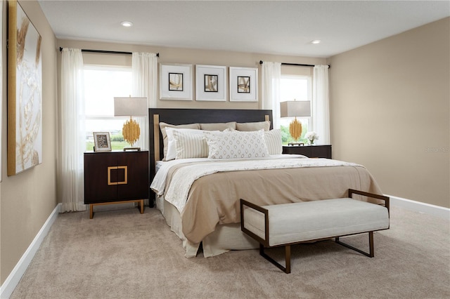 120 Venetian Palms Blvd, New Smyrna Beach, FL 32168 - carpeted bedroom featuring multiple windows and recessed lighting