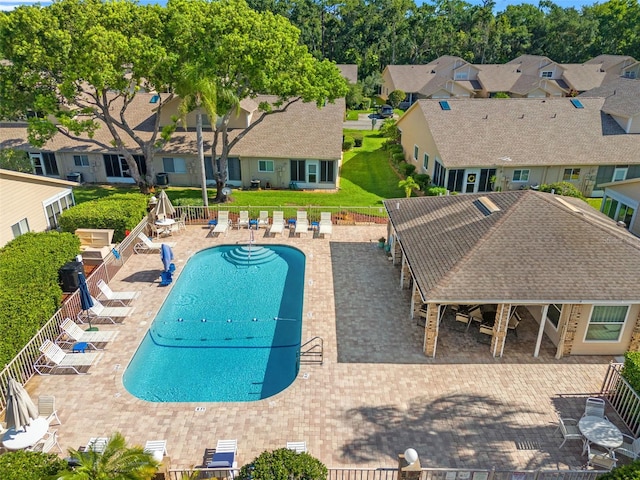 6519 Thicket Trl, New Port Richey, FL 34653 - community pool with a residential view and a patio