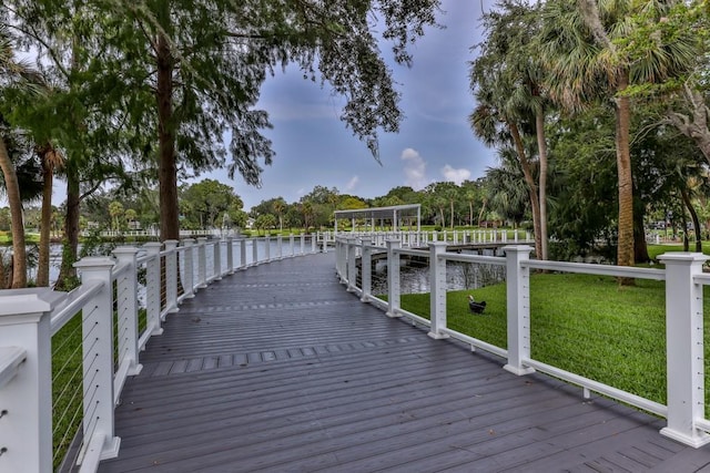6519 Thicket Trl, New Port Richey, FL 34653 - dock area featuring a water view and a lawn