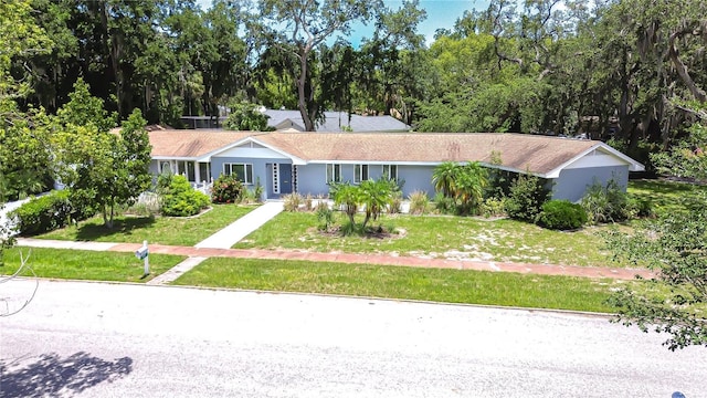 5523 Carlton Rd, New Port Richey, FL 34652 - ranch-style home with a front yard