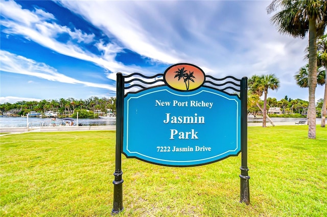 5523 Carlton Rd, New Port Richey, FL 34652 - community sign with a yard and a water view