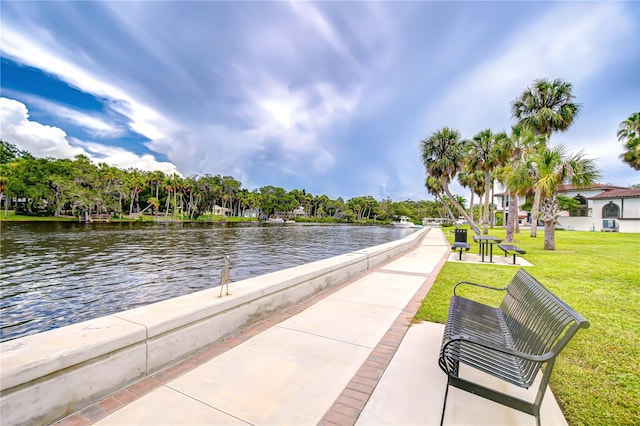 5523 Carlton Rd, New Port Richey, FL 34652 - dock area featuring a water view and a yard