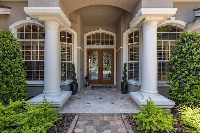 10508 Pontofino Cir, Trinity, FL 34655 - entrance to property featuring french doors and stucco siding