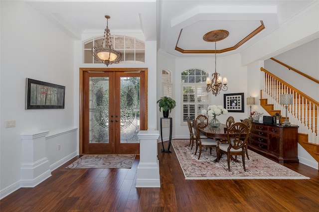 10508 Pontofino Cir, Trinity, FL 34655 - entryway with a chandelier, stairs, french doors, hardwood / wood-style flooring, and ornamental molding