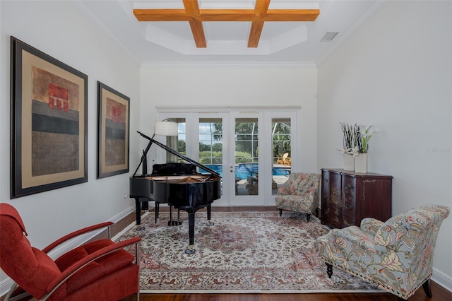 10508 Pontofino Cir, Trinity, FL 34655 - sitting room with french doors, coffered ceiling, crown molding, wood finished floors, and beamed ceiling