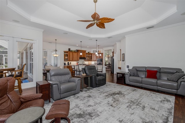 10508 Pontofino Cir, Trinity, FL 34655 - living area featuring dark wood-style floors, a tray ceiling, ceiling fan, french doors, and recessed lighting
