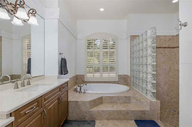 10508 Pontofino Cir, Trinity, FL 34655 - full bath with vanity, a garden tub, a chandelier, walk in shower, and recessed lighting