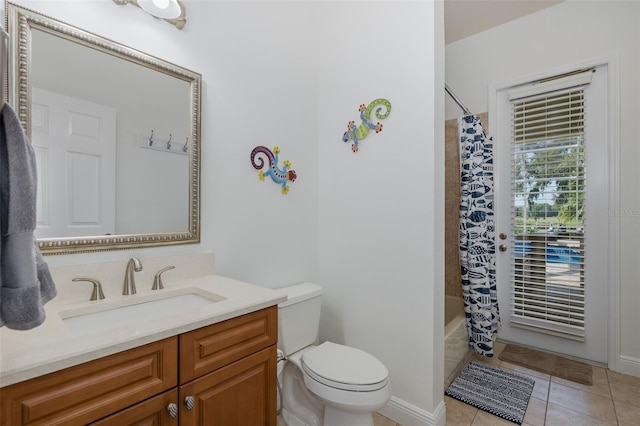 10508 Pontofino Cir, Trinity, FL 34655 - full bathroom with vanity, tile patterned flooring, and shower / bath combo with shower curtain