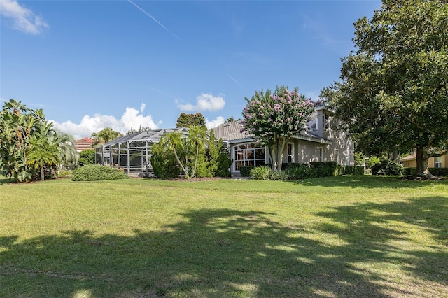 10508 Pontofino Cir, Trinity, FL 34655 - view of green lawn featuring glass enclosure