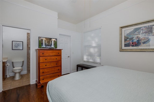 10508 Pontofino Cir, Trinity, FL 34655 - bedroom featuring dark wood-style floors and ensuite bath