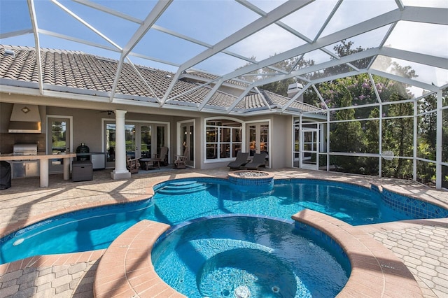 10508 Pontofino Cir, Trinity, FL 34655 - view of pool featuring area for grilling, a pool with connected hot tub, a patio area, a ceiling fan, and glass enclosure