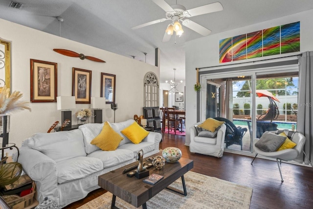 3539 Anniversary Ct, New Port Richey, FL 34653 - living area featuring a chandelier, wood finished floors, a ceiling fan, and high vaulted ceiling