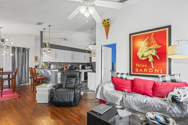 3539 Anniversary Ct, New Port Richey, FL 34653 - living room featuring a ceiling fan, dark wood finished floors, and high vaulted ceiling