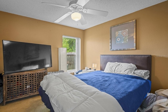3539 Anniversary Ct, New Port Richey, FL 34653 - carpeted bedroom featuring a textured ceiling and a ceiling fan