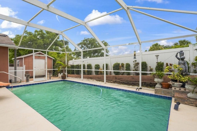3539 Anniversary Ct, New Port Richey, FL 34653 - outdoor pool featuring a shed, a fenced backyard, and glass enclosure