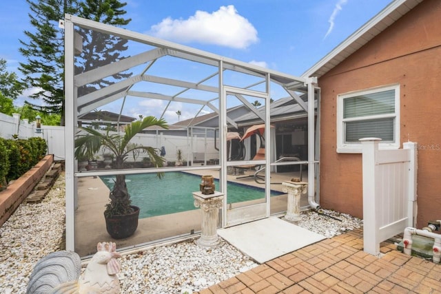 3539 Anniversary Ct, New Port Richey, FL 34653 - view of swimming pool featuring a fenced backyard, a lanai, and a patio area