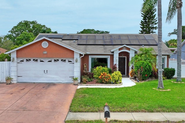 3539 Anniversary Ct, New Port Richey, FL 34653 - ranch-style home with driveway, a shingled roof, an attached garage, stucco siding, and solar panels