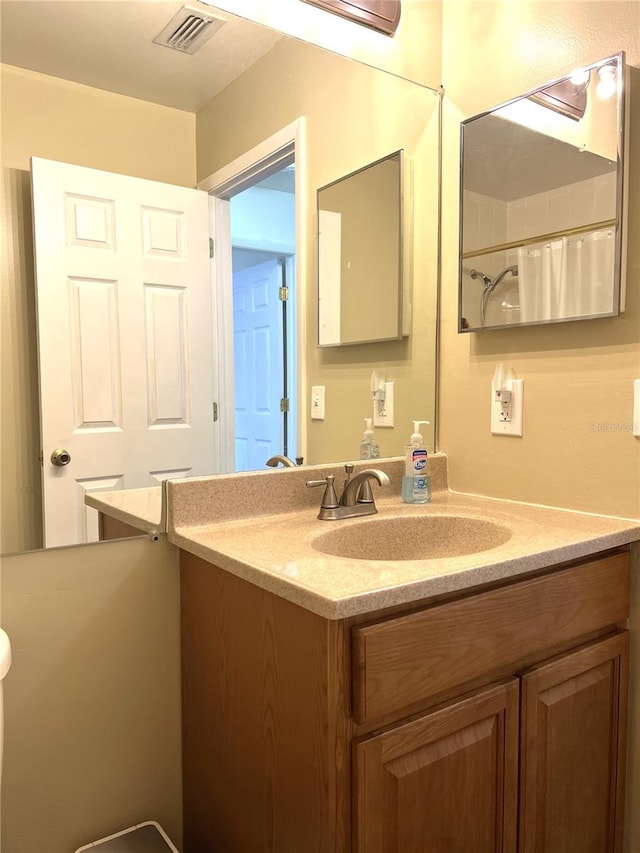 7721 Hillside Ct Unit 203, Hudson, FL 34667 - full bathroom with vanity and a shower with curtain