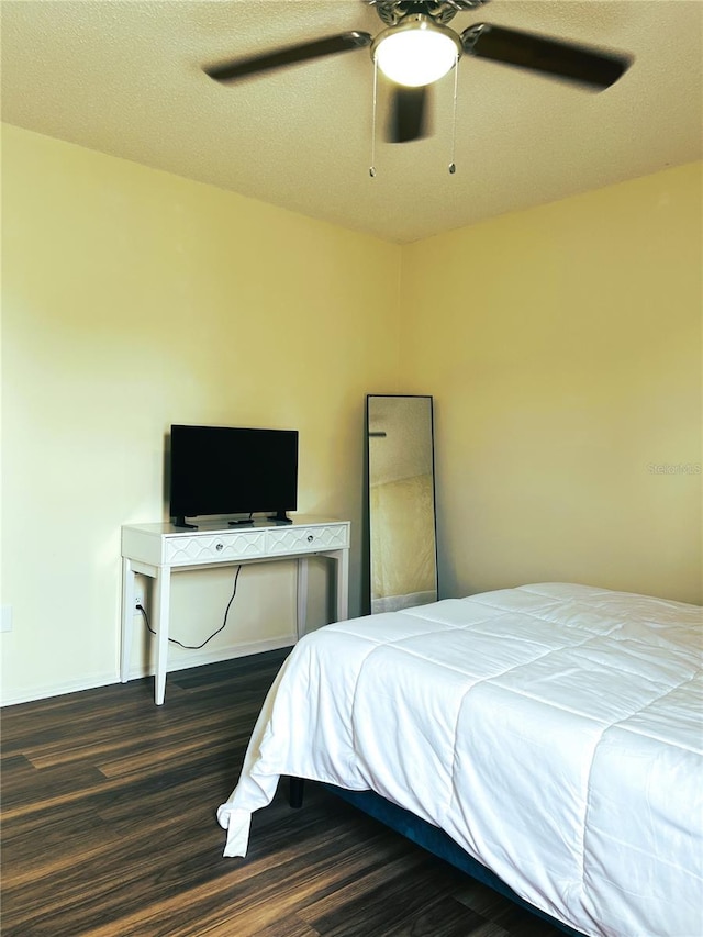 7721 Hillside Ct Unit 203, Hudson, FL 34667 - bedroom with wood finished floors and a ceiling fan