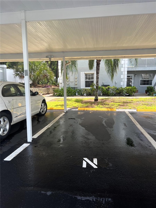 7721 Hillside Ct Unit 203, Hudson, FL 34667 - view of covered parking lot