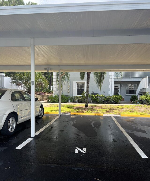 7721 Hillside Ct Unit 203, Hudson, FL 34667 - view of covered parking lot