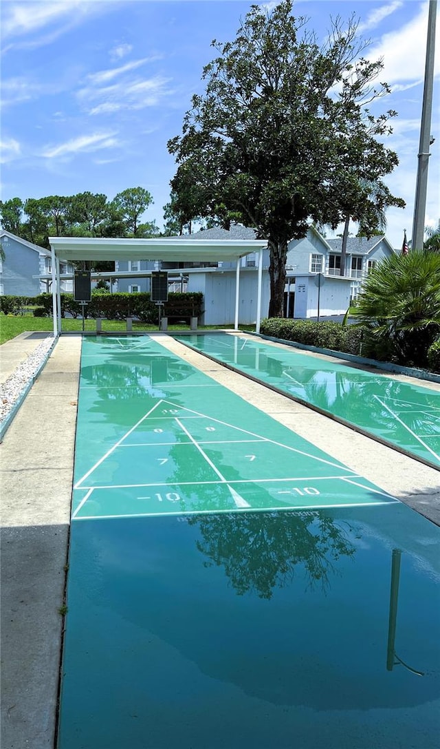 7721 Hillside Ct Unit 203, Hudson, FL 34667 - surrounding community with shuffleboard