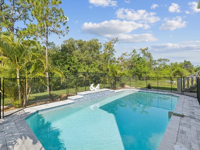 5621 Egrets Pl, New Port Richey, FL 34652 - view of pool featuring view of wooded area