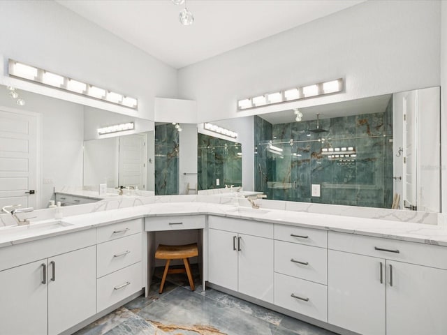 5621 Egrets Pl, New Port Richey, FL 34652 - bathroom with a marble finish shower, double vanity, and marble look tiles