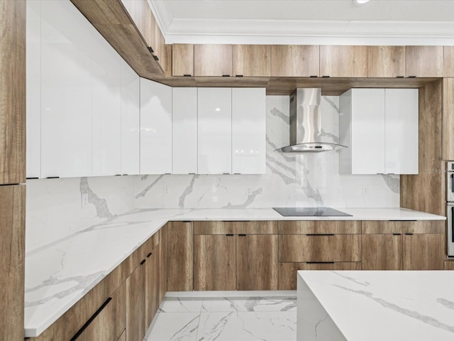5621 Egrets Pl, New Port Richey, FL 34652 - kitchen with modern cabinets, white cabinets, wall chimney exhaust hood, light stone countertops, and ornamental molding