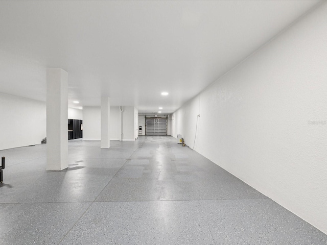 5621 Egrets Pl, New Port Richey, FL 34652 - garage featuring recessed lighting