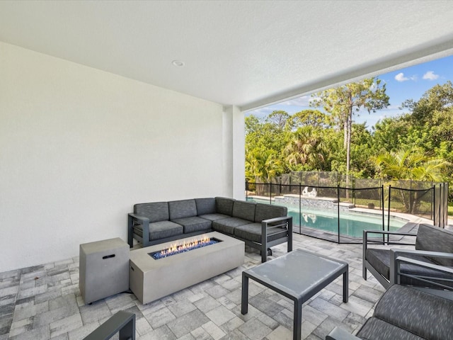 5621 Egrets Pl, New Port Richey, FL 34652 - view of patio featuring an outdoor living space with a fire pit