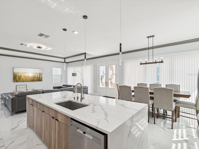 5621 Egrets Pl, New Port Richey, FL 34652 - kitchen featuring modern cabinets, open floor plan, stainless steel dishwasher, light marble finish flooring, and crown molding